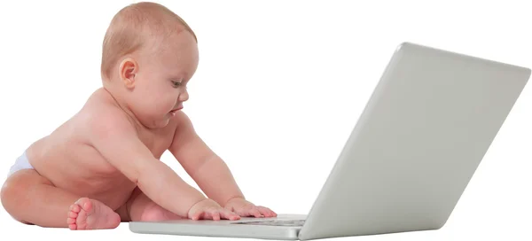 Aranyos baba fiú laptop számítógép segítségével — Stock Fotó