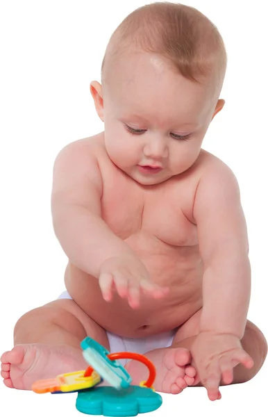 Cute baby boy playing with toy Stock Photo