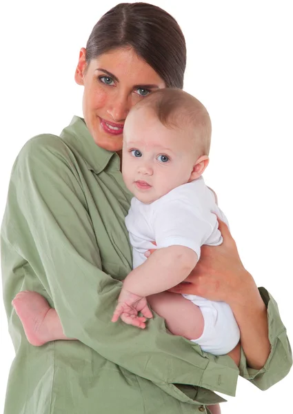 Milující mladá matka nesoucí chlapeček — Stock fotografie