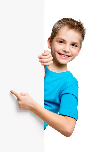 Portrait of happy little boy with white blank Stock Photo