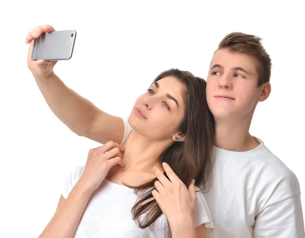 Young happy couple taking Selfie pictures on mobile cell phone — Stok fotoğraf