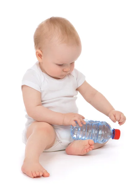 Infant child baby girl sitting with big bottle of drinking water — Stock Photo, Image