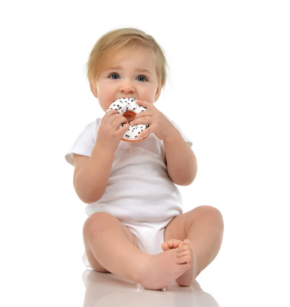 Infant child baby boy toddler eat sweet donut candy fast food — Stock Photo, Image