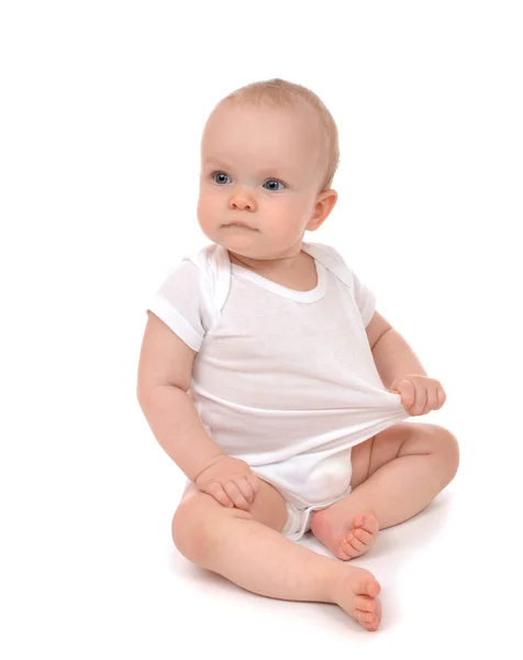 Infant child baby girl in diaper sitting and happy looking at th — Stock Photo, Image