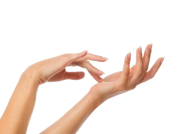 Schöne Frauenhände mit französischen Maniküre-Nägeln — Stockfoto