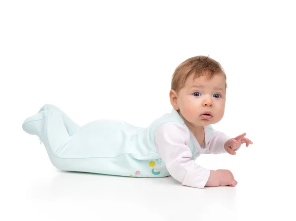Vier maanden zuigeling kind babymeisje liggend op een vloer — Stockfoto