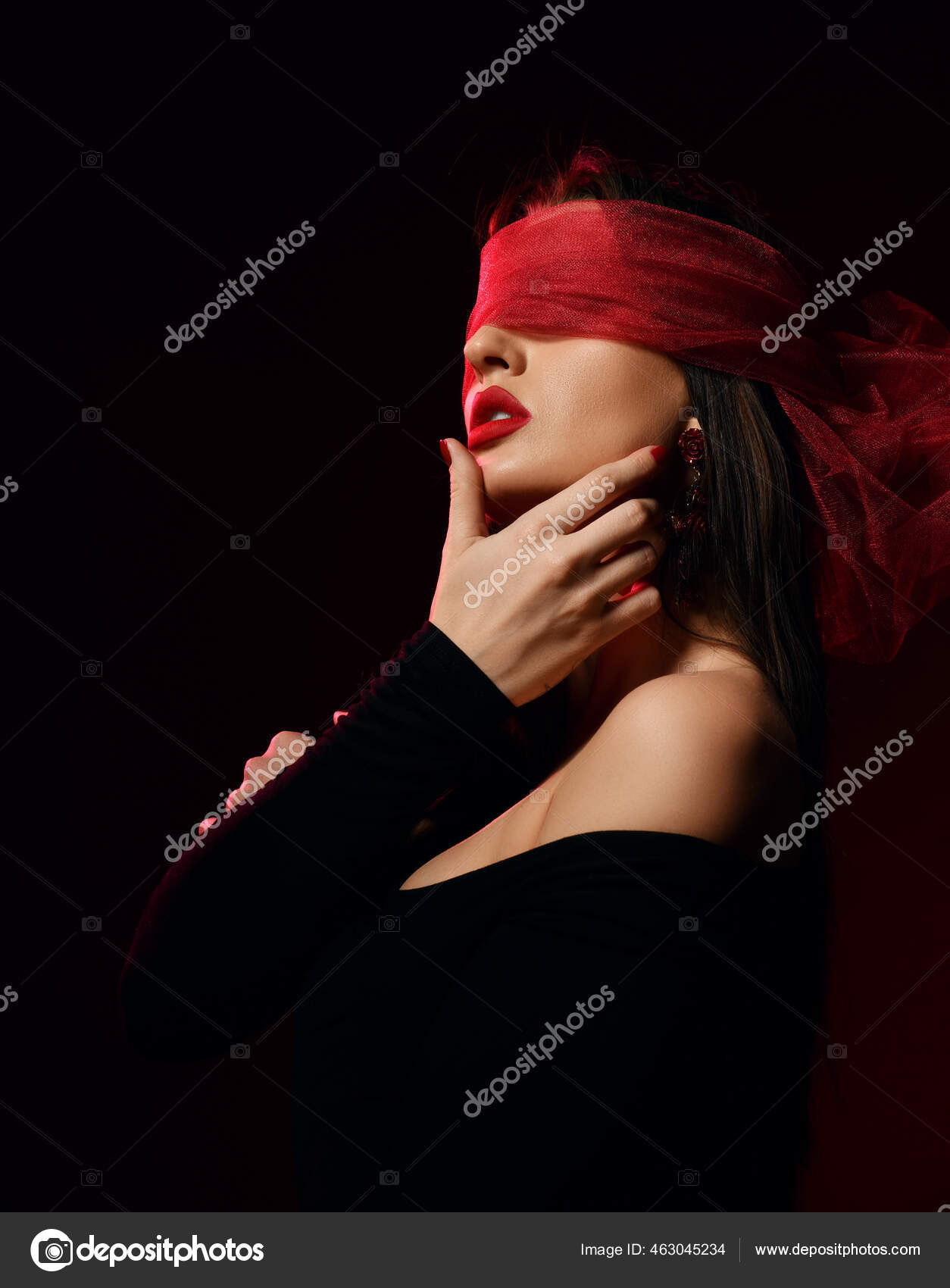 Profile. Excited brunette woman in off-shoulder clothes, eyes covered ...