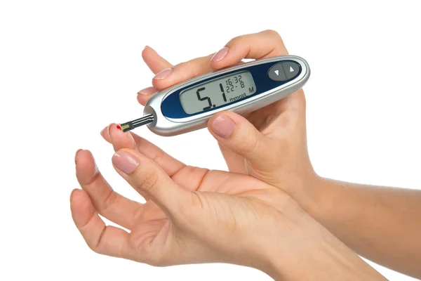 Diabetes patient measuring glucose level blood test i — Stock Photo, Image