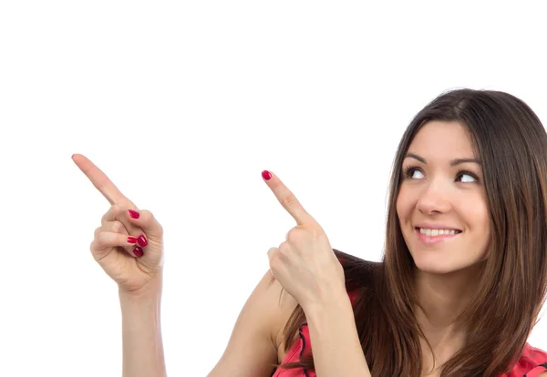 Frau zeigt mit dem Finger auf Ecke mit Kopierraum — Stockfoto