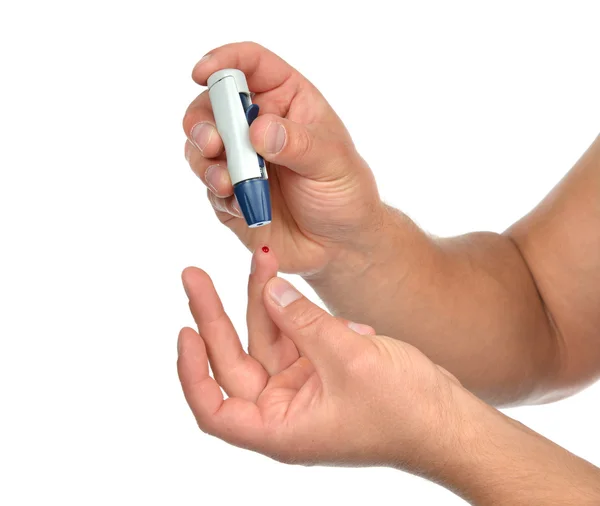 Diabetes patient finger to make glucose level blood test — Stock Photo, Image