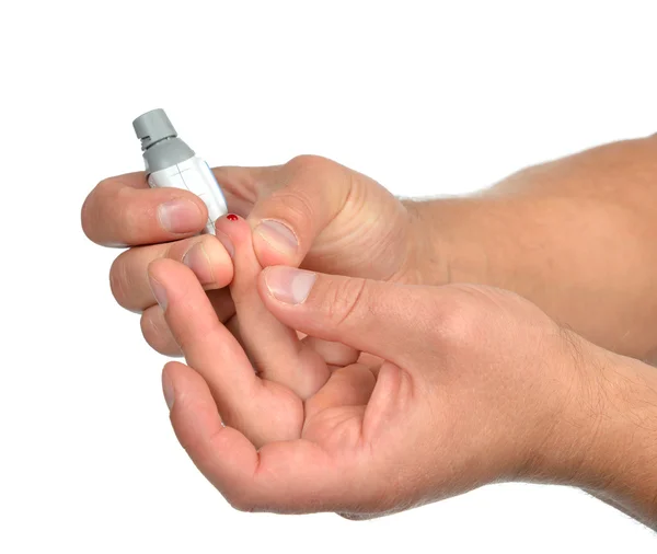 Diabetes patient finger to make glucose level blood test — Stock Photo, Image