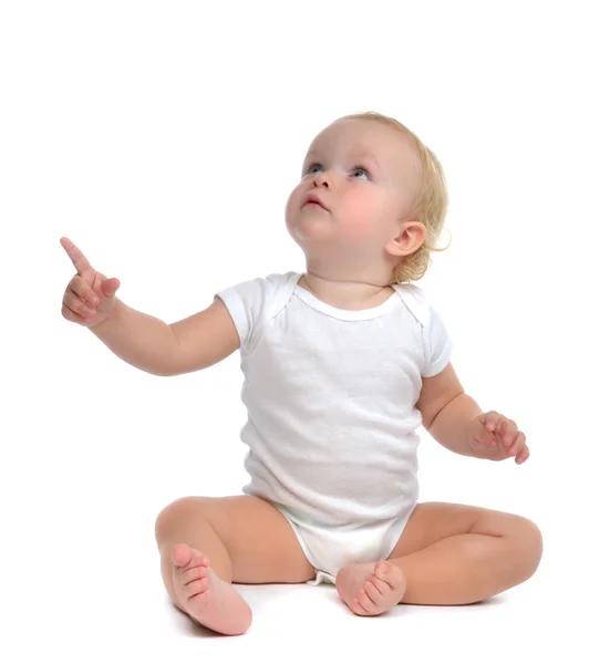 Niño bebé niño sentado levante la mano apuntando con el dedo — Foto de Stock