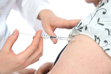 Doctor making senior woman patient an arm subcutaneous insulin m clipart