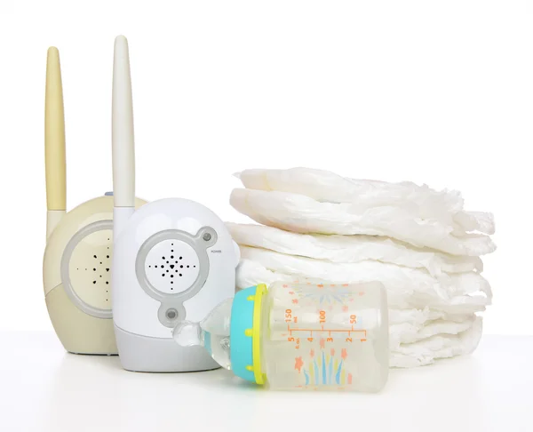 Child baby kid radio monitor device stack of diapers — Stock Photo, Image