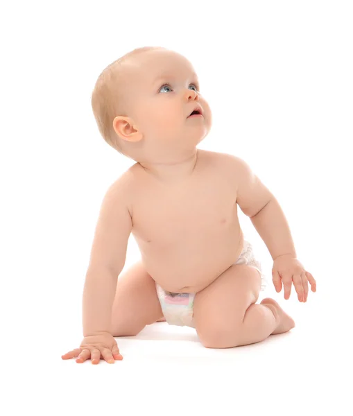 Niño de 9 meses niño pequeño sentado o gateando mirando hacia arriba —  Fotos de Stock