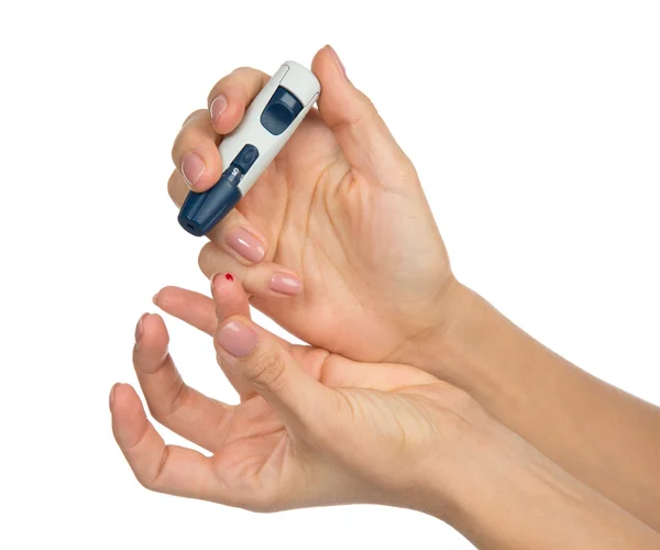 Diabetes diabetic concept finger prick for glucose sugar measuri — Stock Photo, Image