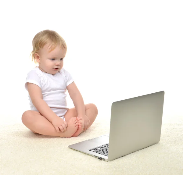 Child baby girl toddler sitting with modern wireless computer la — Stock Photo, Image