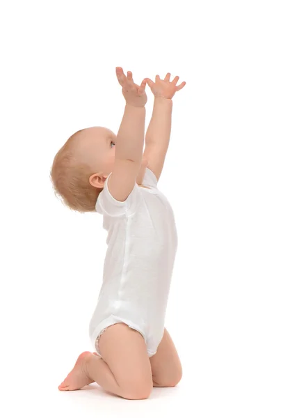 Infant child baby toddler sitting raise hands up — Stock Photo, Image