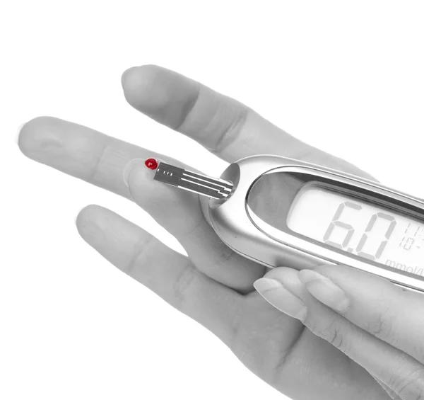 Diabetes patient hands measuring glucose level blood test — Stock Photo, Image