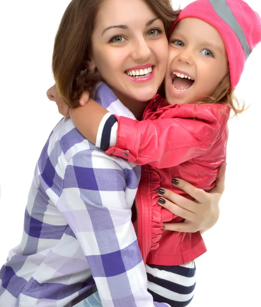 Mother and daughter laughing together hugging smiling — Stock Photo, Image