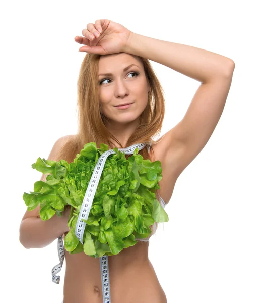 Gyönyörű fiatal nő, a diéta egészséges étel saláta és szalag m — Stock Fotó