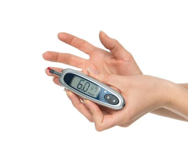 Diabetes patient measuring glucose level blood test i — Stock Photo, Image