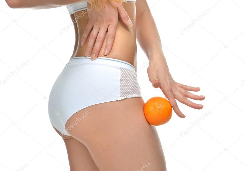 Hips legs buttocks and orange in hand cellulite liposuction woma