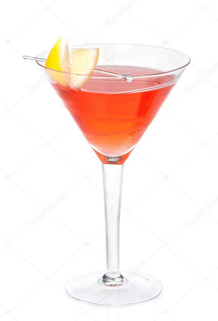 red alcohol cosmopolitan cocktail decorated with citrus lemon in