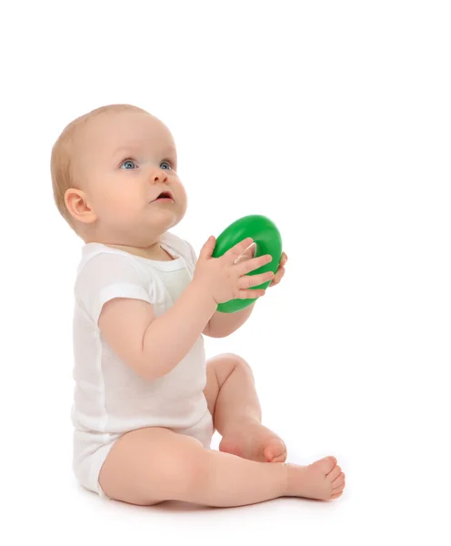 Infant child baby boy toddler playing holding green circle in ha — Stock Photo, Image