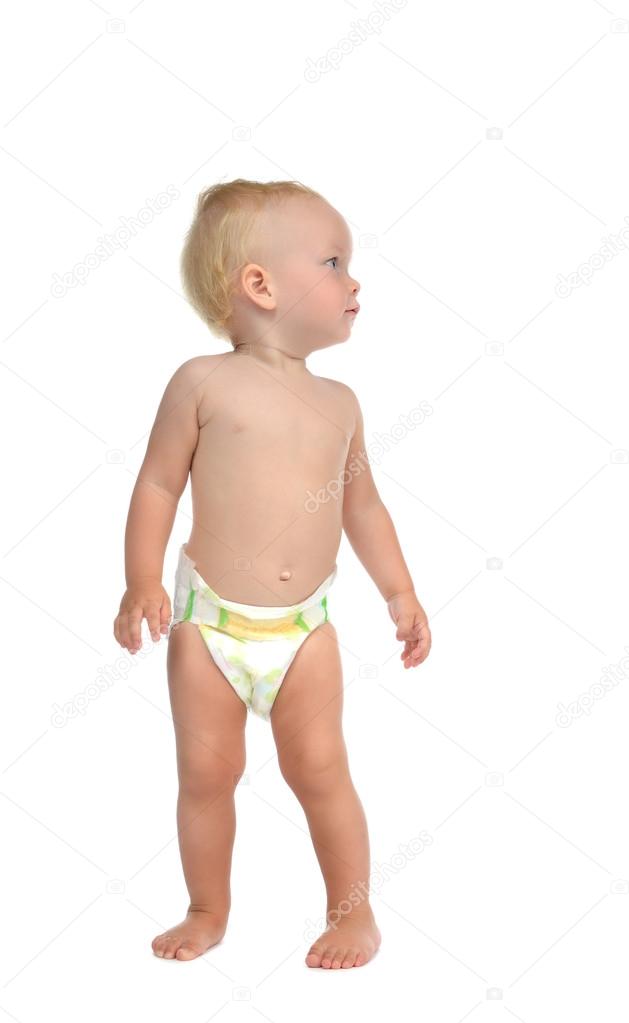 Infant child baby kid toddler standing make first steps looking 