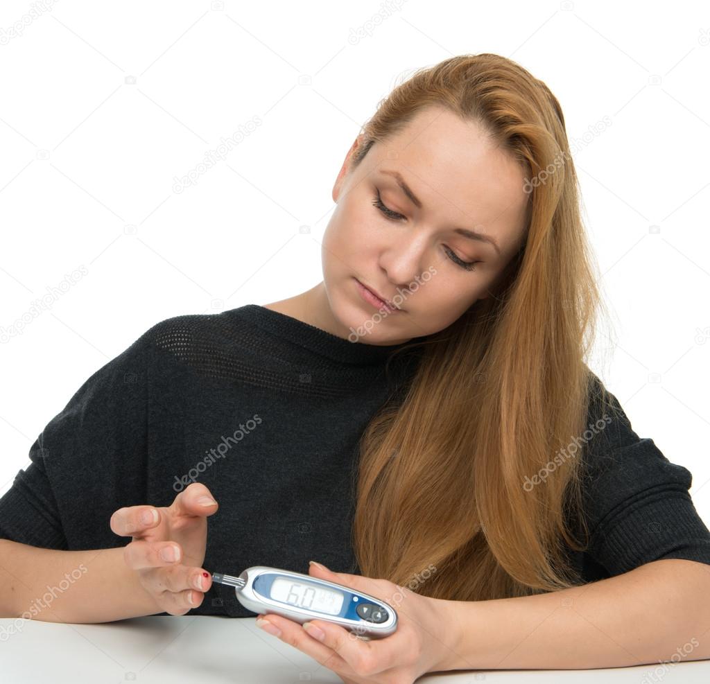 Diabetic patient measuring glucose level blood test using ultra 