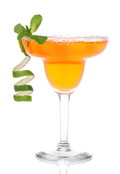 Orange Margarita cocktail with mint and lime spiral in chilled s — Stock Photo, Image