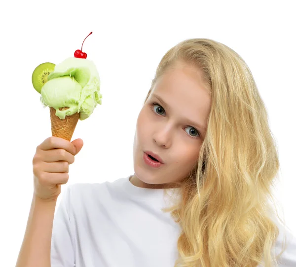 Baby girl kid holding ice cream in waffles cone with raspberry a — Stockfoto