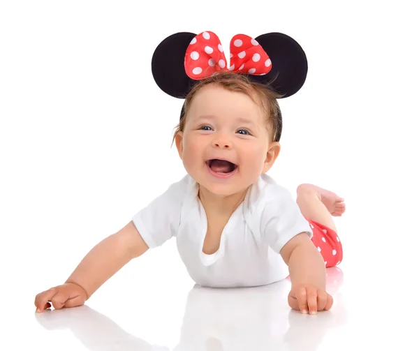 New born Infant child baby girl in red body cloth lying happy sm — Stockfoto