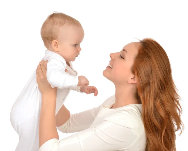 Woman holding and hugging in her arms infant child baby kid girl — Stock fotografie