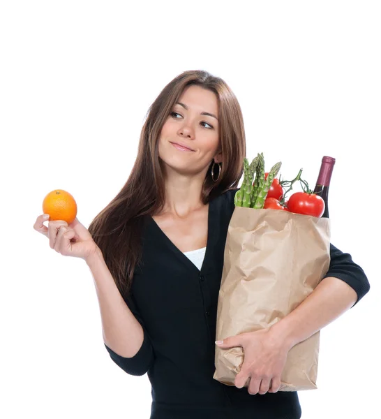 Young woman holding shopping bag with groceries vegetables — Stock Photo, Image