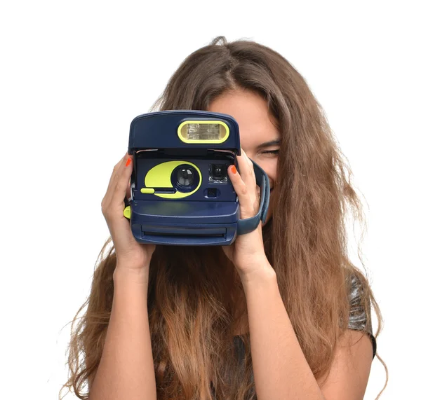 Young teenage girl taking photo holding old retro camera — ストック写真