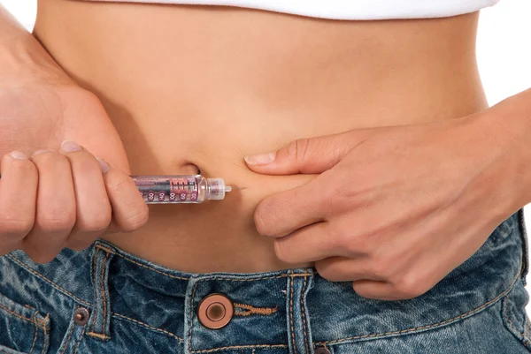 Diabetes patient insulin shot by syringe with dose of lantus — Stock Photo, Image