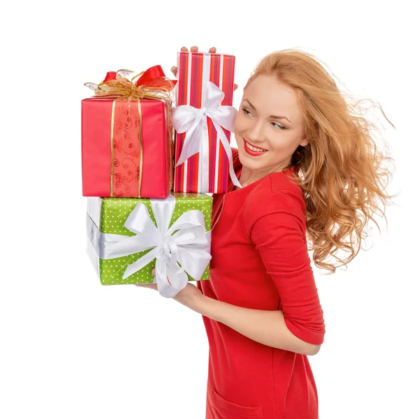Happy young beautiful woman hold red Christmas wrapped gift pres — Stok fotoğraf