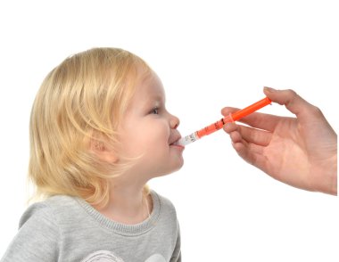 Baby toddler child take an oral medical suspensionan ibuprofen