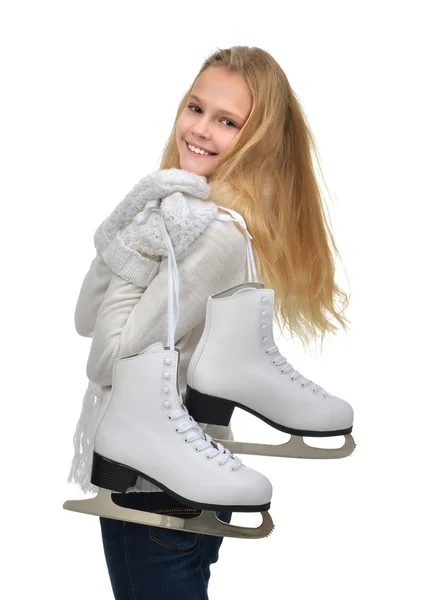 Young teenage girl holding ice skates for winter ice skating spo Stock Photo