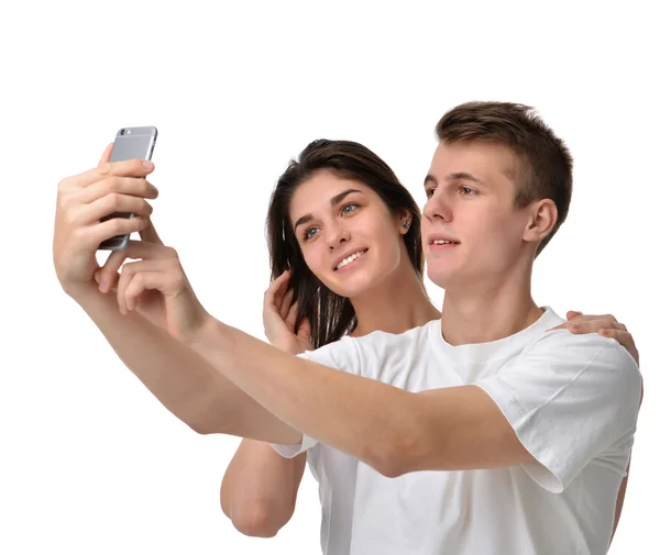 Selfie couple taking pictures on mobile cell phone — Stockfoto