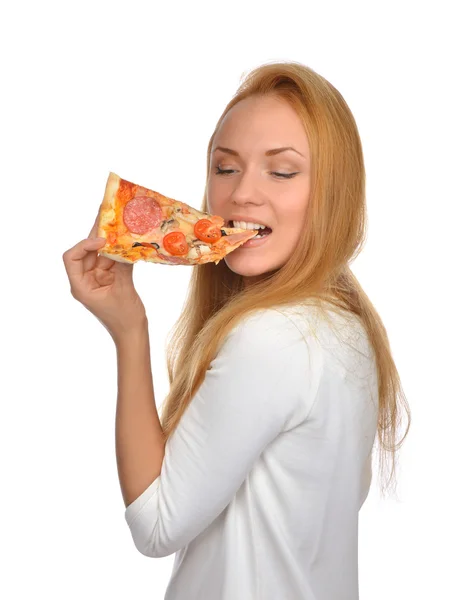 Happy woman enjoy eating slice of pepperoni pizza with tomatoes Stock Photo