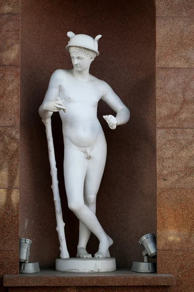 Statue of a naked man on a historic — Stock Photo, Image