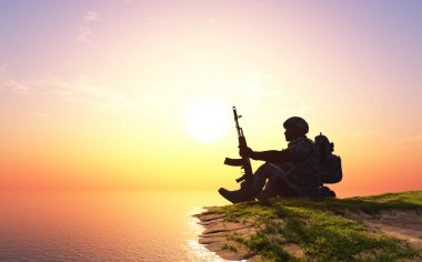 Sahildeki bir askerin silueti.