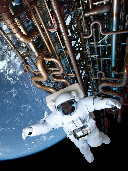 The astronaut around the structure. — Stock Photo, Image