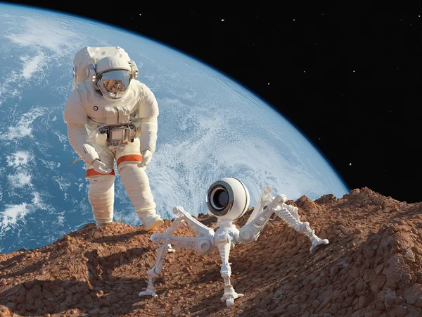 Astronauta y robot — Foto de Stock