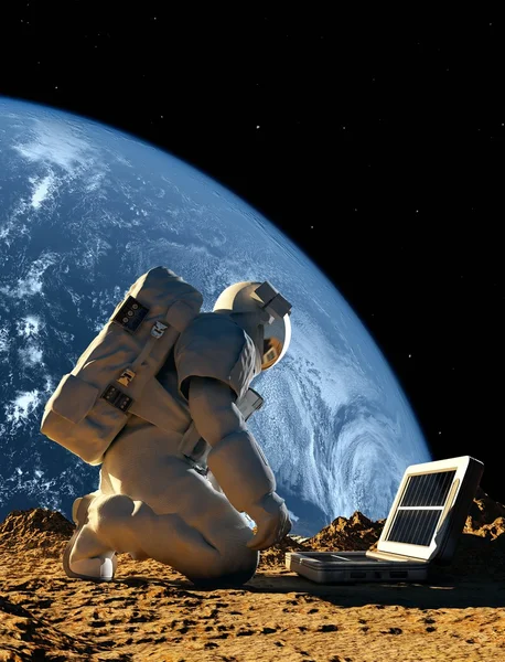 Astronaut met het apparaat — Stockfoto