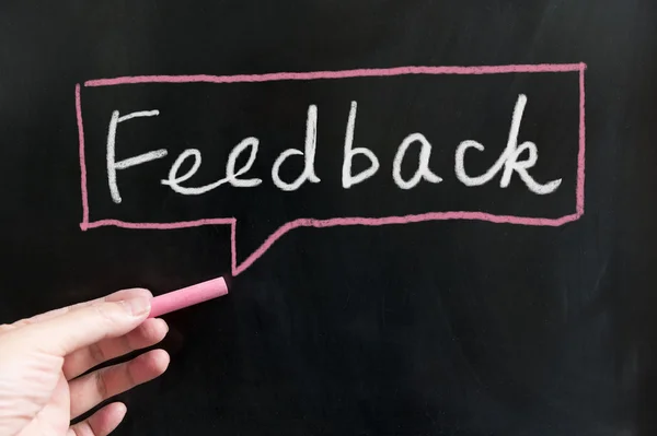 Feedback woorden op blackboard — Stockfoto