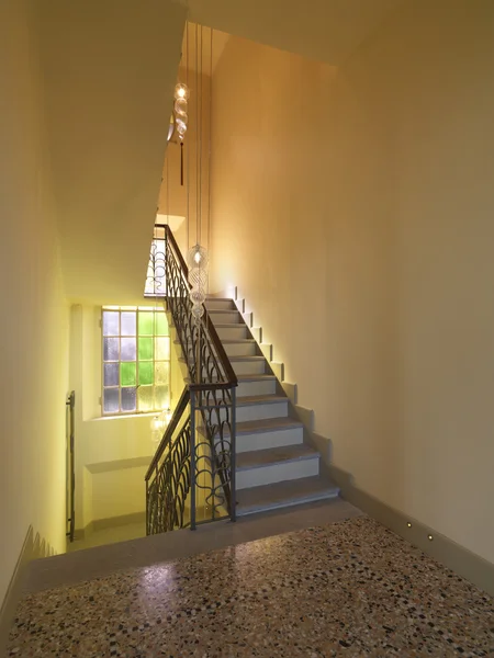 Landing with old staircase and marble floor — Stock Photo, Image